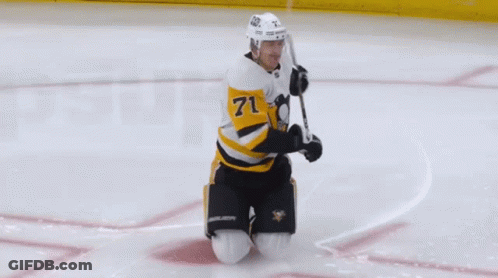 A Hockey Player Wearing A Jersey With The Number 4 On It GIF