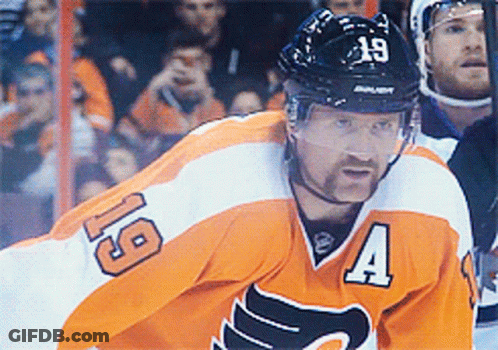 A Hockey Player Wearing A Jersey With The Number 4 On It GIF