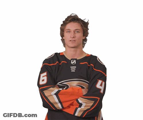 A Hockey Player Wearing A Jersey With The Number 6 And 4 On It GIF