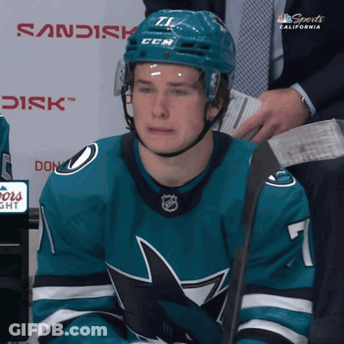 A Hockey Player Wearing A Jersey With The Number 7 On It GIF