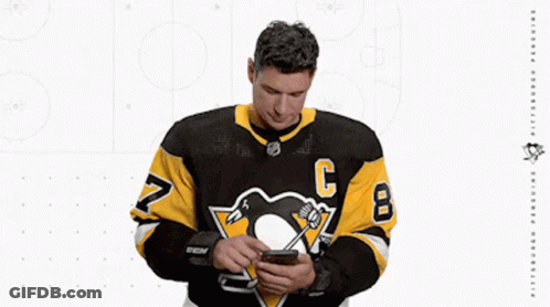 A Hockey Player Wearing A Jersey With The Number 8 On It GIF