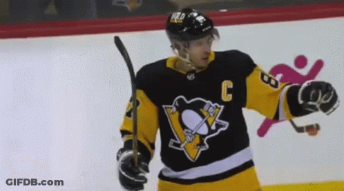 A Hockey Player Wearing A Jersey With The Number C On It GIF