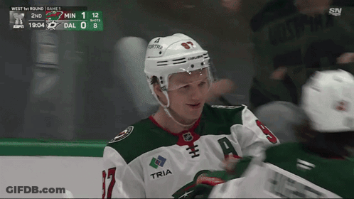 A Hockey Player Wearing A Jersey With The Word Tria On It GIF