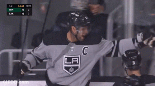 A Hockey Player Wearing A La Jersey Celebrates His Goal GIF