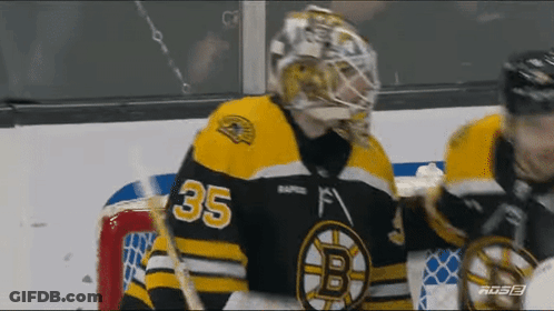 A Hockey Player Wearing A Number 35 Jersey GIF