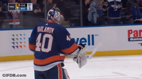 A Hockey Player Wearing A Number 40 Jersey GIF