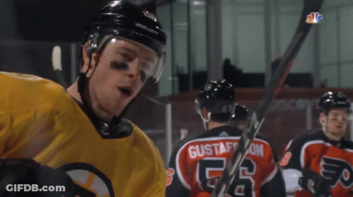 A Hockey Player Wearing A Number 56 Jersey GIF