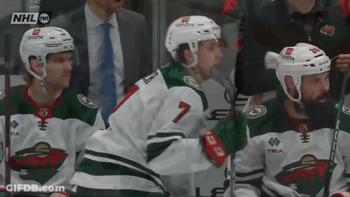 A Hockey Player Wearing A Number 7 Jersey GIF