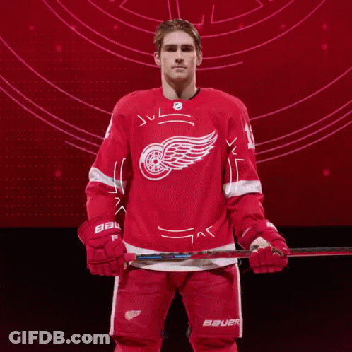 A Hockey Player Wearing A Red Bauer Jersey GIF