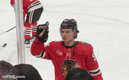 A Hockey Player Wearing A Red Jersey That Says Croca Sports GIF