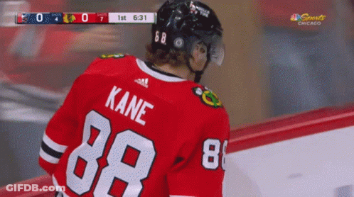A Hockey Player Wearing A Red Jersey With Kane 88 On The Back GIF