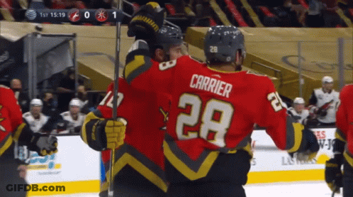 A Hockey Player Wearing A Red Jersey With The Number 29 On It GIF
