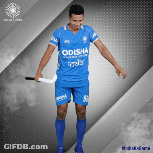 A Hockey Player Wearing An Odisha Jersey Holds A Stick GIF