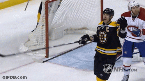 A Hockey Player With The Letter B On His Jersey Stands On The Ice GIF