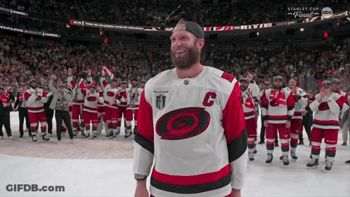 A Hockey Player With The Letter C On His Shirt GIF