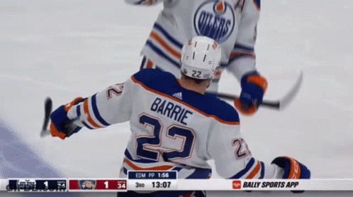 A Hockey Player With The Name Barrie On The Back Of Their Jersey GIF