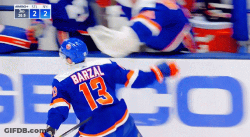 A Hockey Player With The Name Barzal On His Back GIF