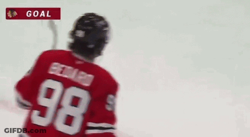 A Hockey Player With The Name Bedard On His Jersey GIF