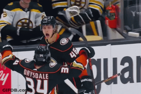 A Hockey Player With The Name Drysdale On His Jersey Is Celebrating A Goal GIF
