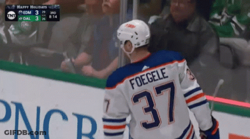 A Hockey Player With The Name Foggele On His Jersey GIF