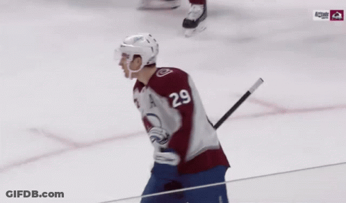 A Hockey Player With The Name Mackinnon On His Jersey GIF