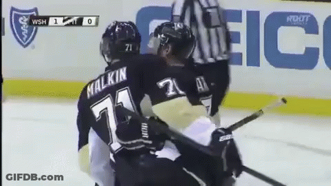 A Hockey Player With The Name Malkin On His Back GIF