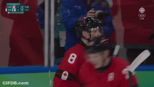 A Hockey Player With The Name Mcdavid On The Back Of His Shirt GIF