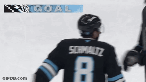 A Hockey Player With The Name Schmidt On His Back GIF