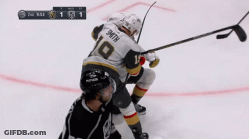 A Hockey Player With The Name Smith On His Back GIF