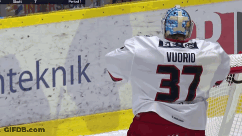 A Hockey Player With The Name Vuorio On The Back Of His Shirt GIF