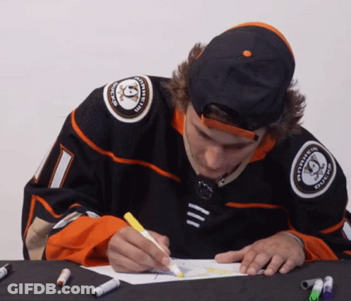 A Hockey Player With The Number 1 On His Jersey Is Drawing GIF