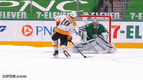 A Hockey Player With The Number 10 On The Back Of His Shirt GIF