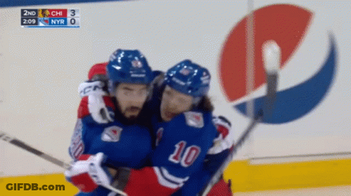 A Hockey Player With The Number 10 On Their Jersey GIF