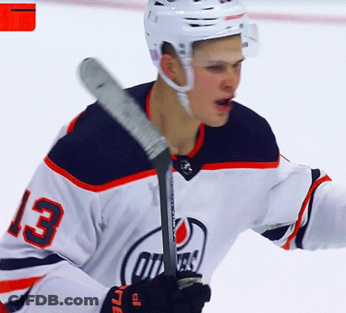 A Hockey Player With The Number 13 On His Shirt GIF