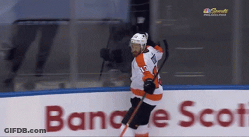 A Hockey Player With The Number 13 On His Shirt GIF