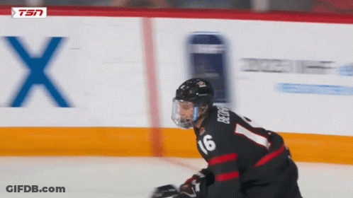 A Hockey Player With The Number 16 On His Back GIF