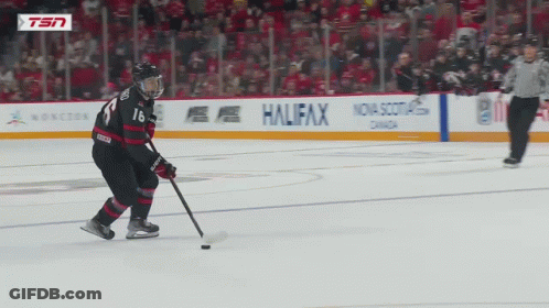 A Hockey Player With The Number 16 On His Shirt GIF