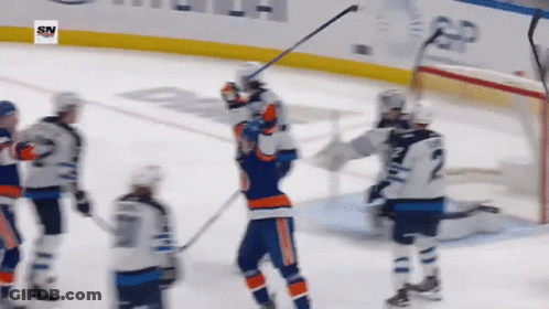 A Hockey Player With The Number 2 On His Back GIF