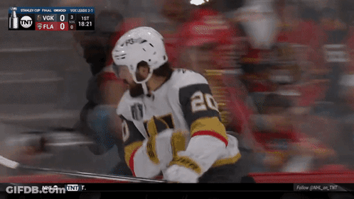 A Hockey Player With The Number 20 On His Jersey Is On The Ice GIF