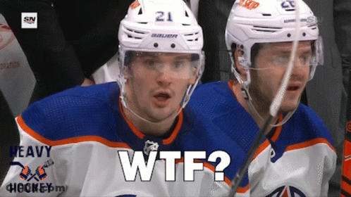 A Hockey Player With The Number 21 On His Helmet Looks At The Camera GIF