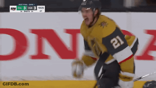 A Hockey Player With The Number 21 On His Jersey Is On The Ice GIF
