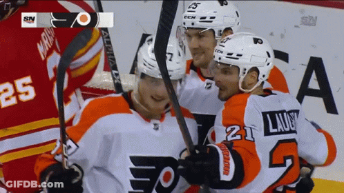 A Hockey Player With The Number 21 On The Back Of His Shirt GIF
