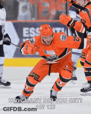 A Hockey Player With The Number 22 On His Jersey Is Standing On The Ice GIF