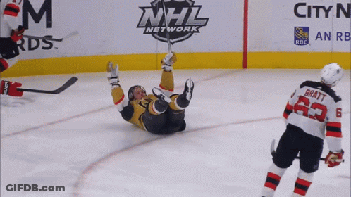 A Hockey Player With The Number 23 On His Jersey GIF