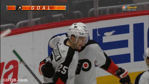 A Hockey Player With The Number 25 On The Back Of His Shirt GIF