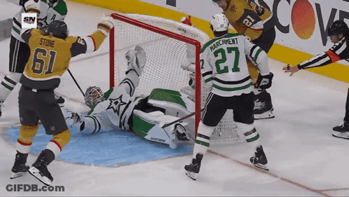 A Hockey Player With The Number 27 On The Back Of His Shirt GIF