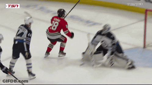 A Hockey Player With The Number 28 On His Back GIF