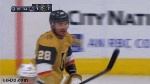 A Hockey Player With The Number 28 On His Jersey Is Smiling GIF