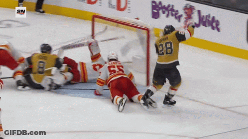 A Hockey Player With The Number 28 On His Shirt GIF