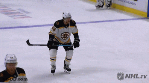 A Hockey Player With The Number 28 On Their Jersey GIF